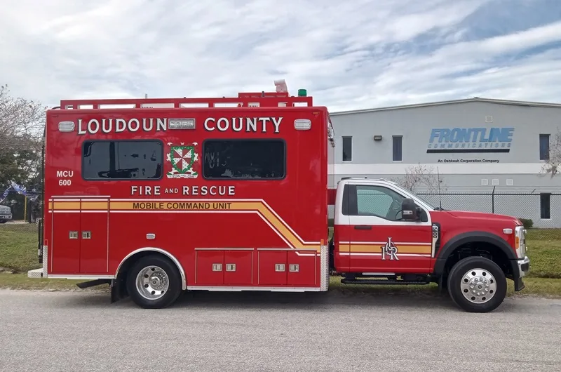 Frontline Communications Small Mobile Command vehicle for Loudoun County Fire Rescue parked outside on a cloudy day.