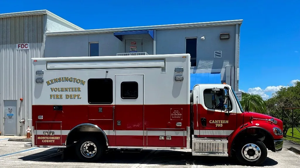 Kensington VFD C-26 Canteen Specialty vehicle parked outside of the Frontline Communications building on a sunny day.