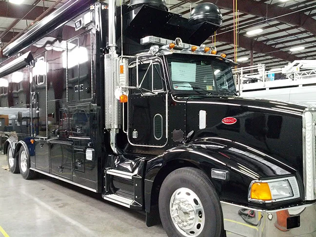 Frontline Communications FBI vehicle after the technology refresh parked inside of the manufacturing facility.