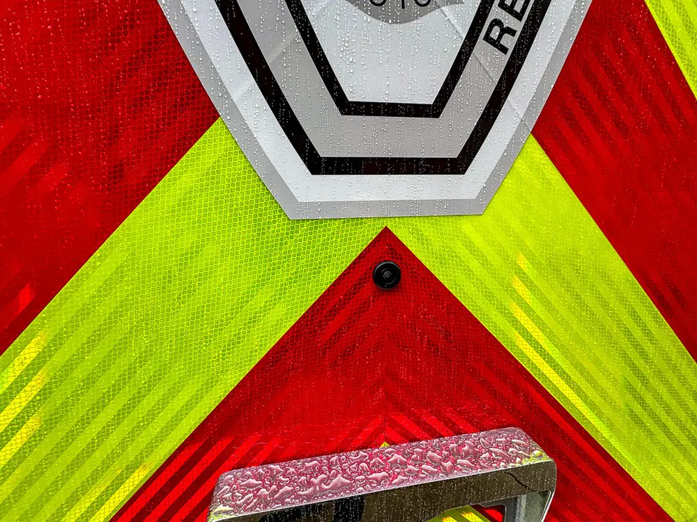 Chevron rear door center section and badge close-up.