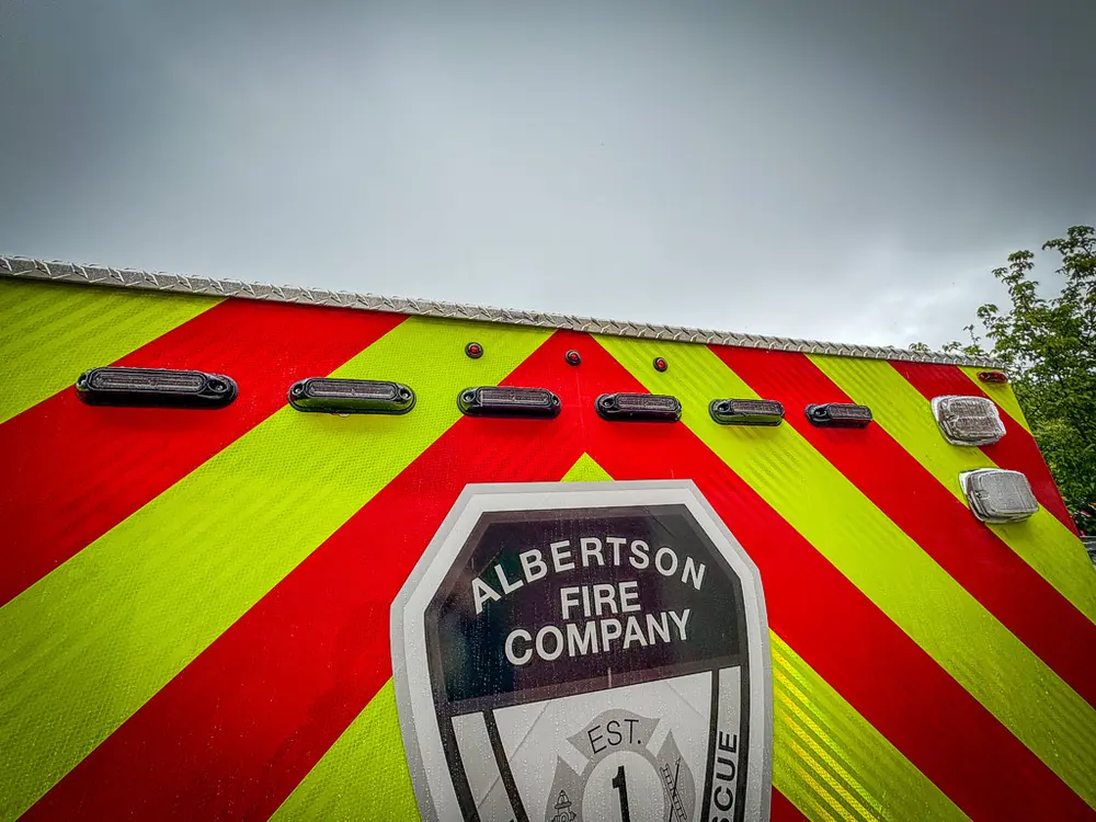 Top of rear chevron door with Albertson Fire Company crest.