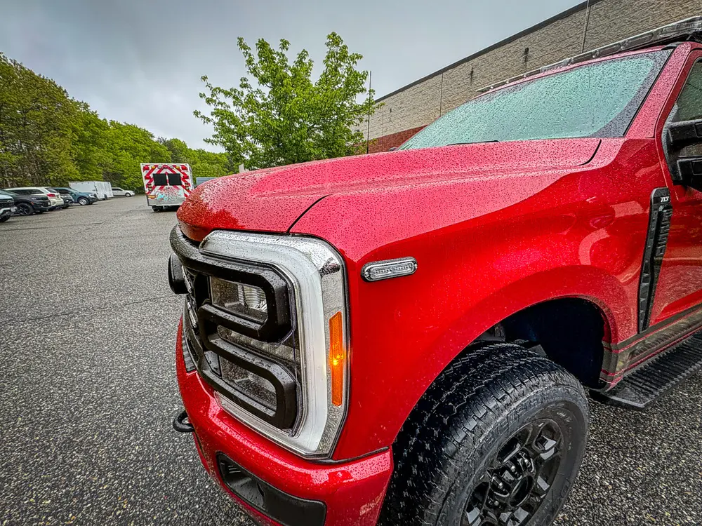 Front fender and wheel arch close-up on passenger side.