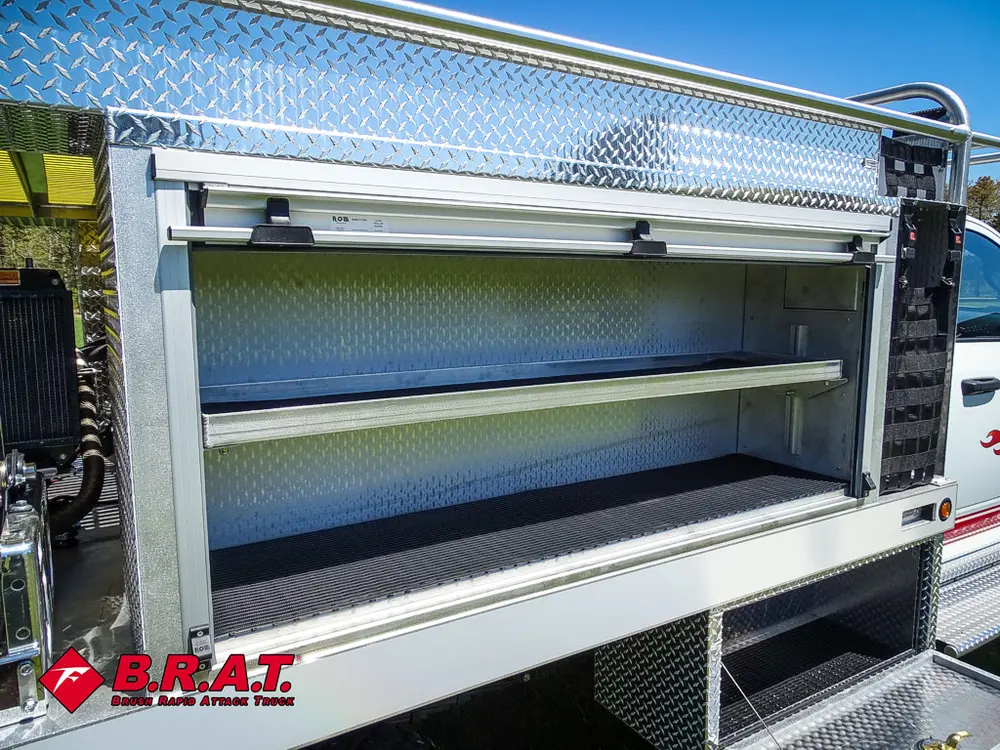 Open side body shelf with metal liner and roll-up frame.