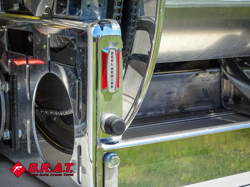 Open rear corner compartment with cylindrical tank opening.