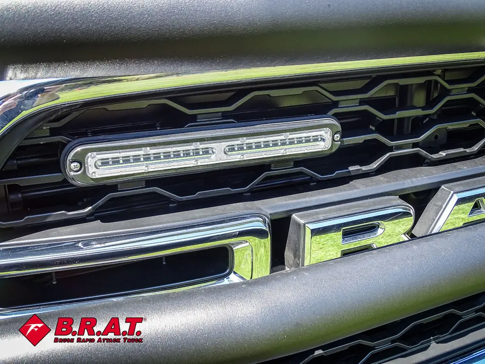 Grille center with integrated warning light bar.