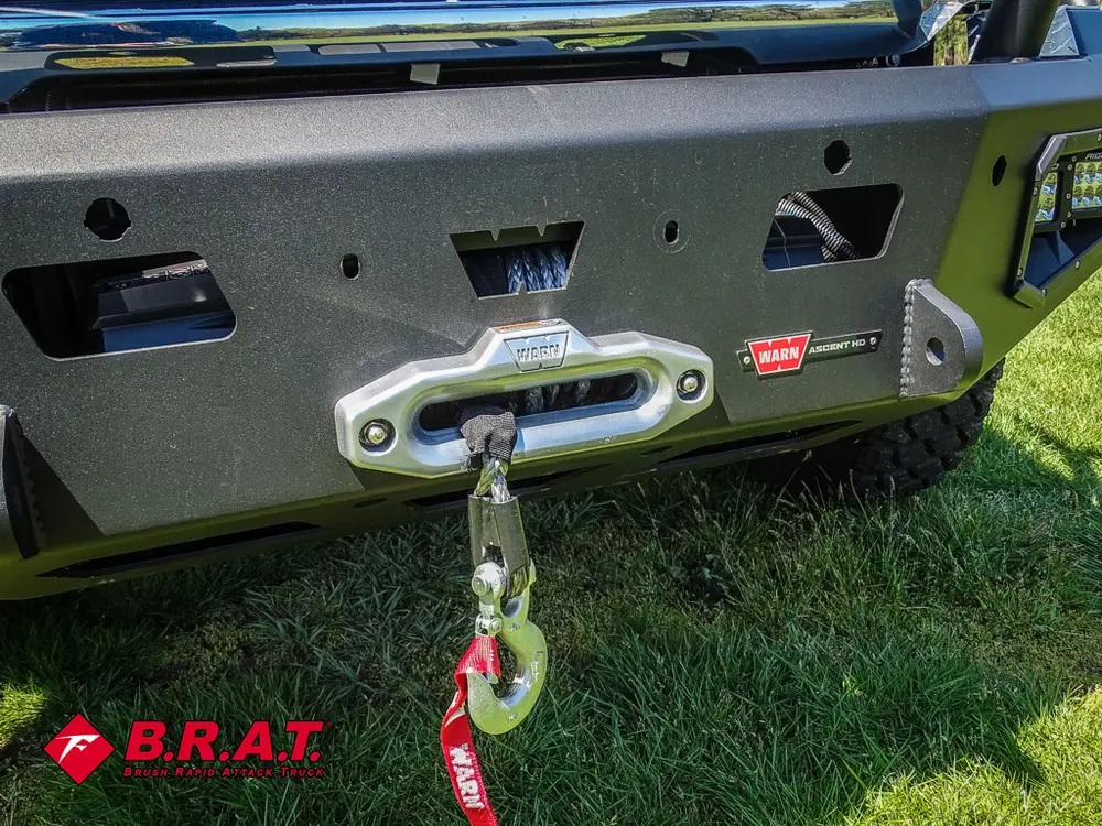 Bumper-mounted dual winch hooks close-up.