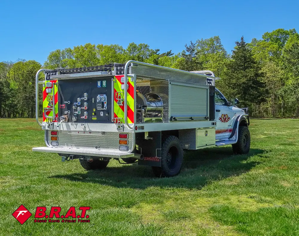 Rear three-quarter view with side compartments and rack.