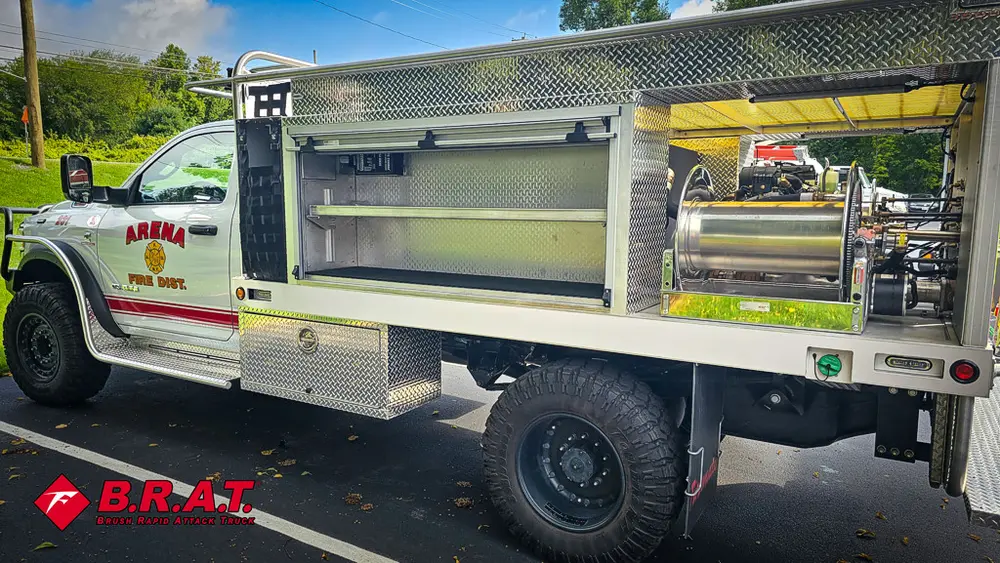 Driver-side rear compartment open showing long shelf.