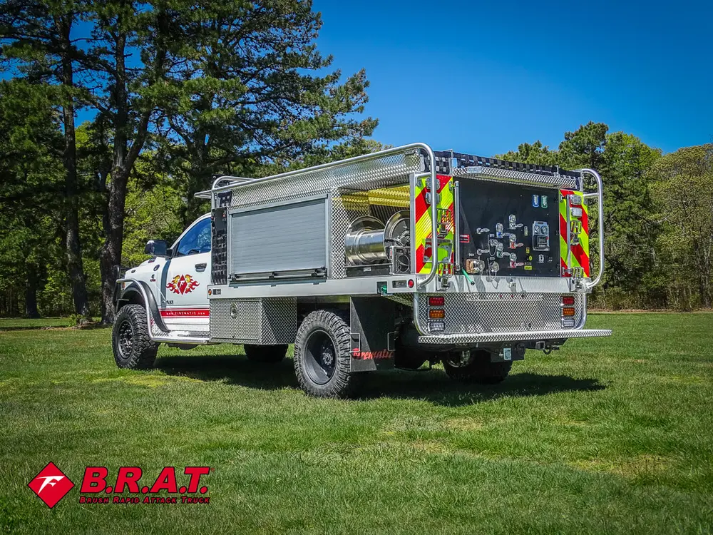 Rear driver-side angle parked on grass.