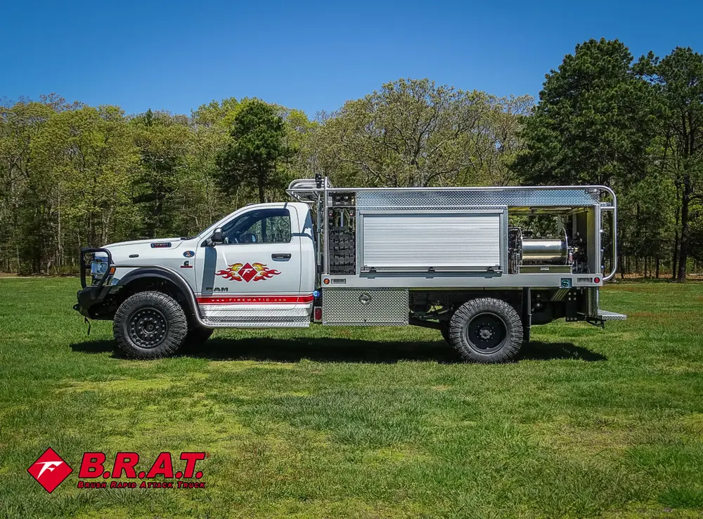 Full driver-side profile with utility body compartments.