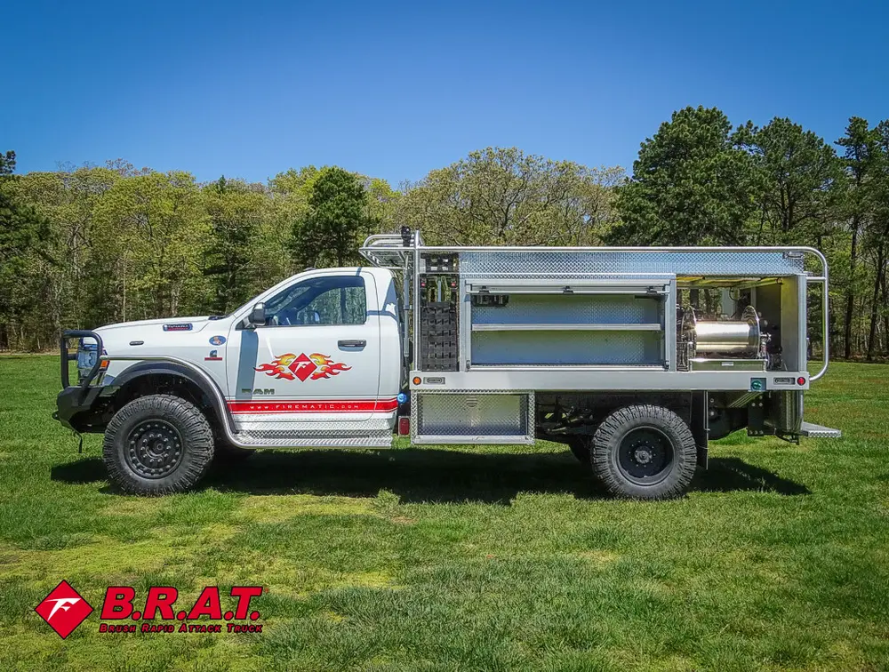 Driver-side profile with side compartments open.