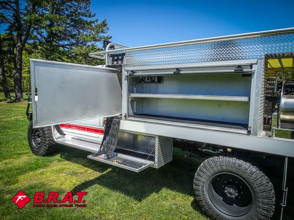 Rear side shelf compartment open with tray rails.