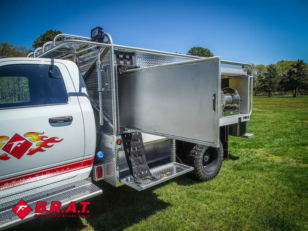 Large side panel open upward on utility body.