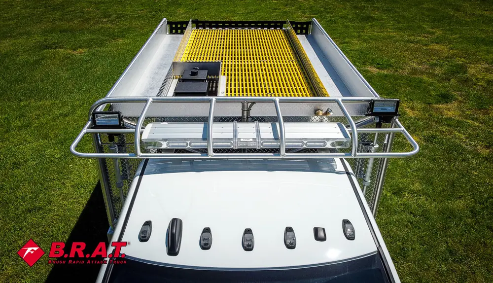 Top view of hood and roof rack from elevated rear position.