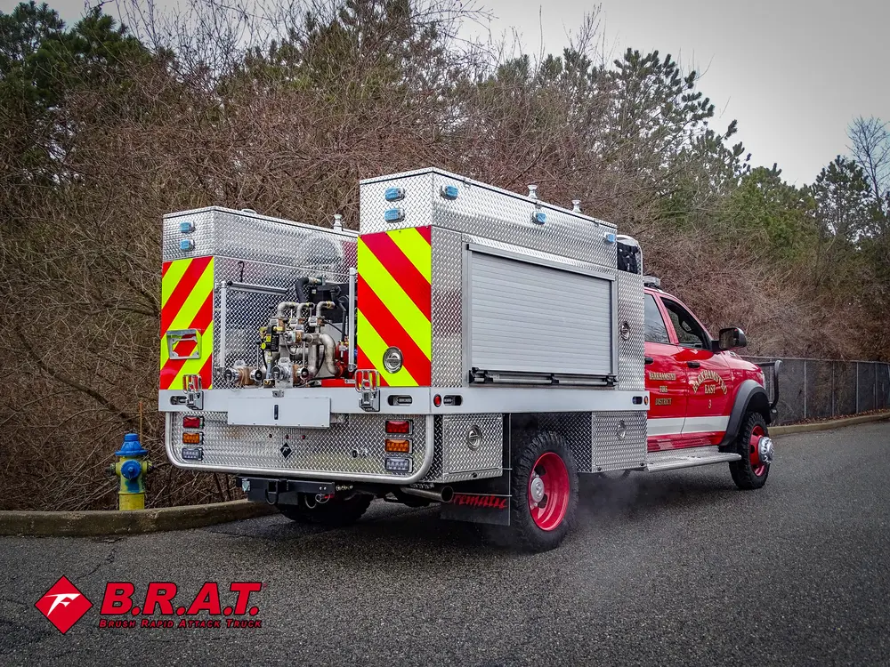 Rear driver-side angle with chevron striping on back panel.