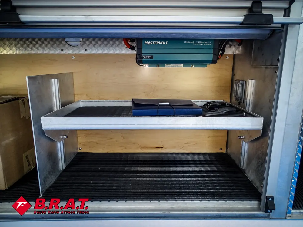 Long horizontal compartment with sliding tray extended.