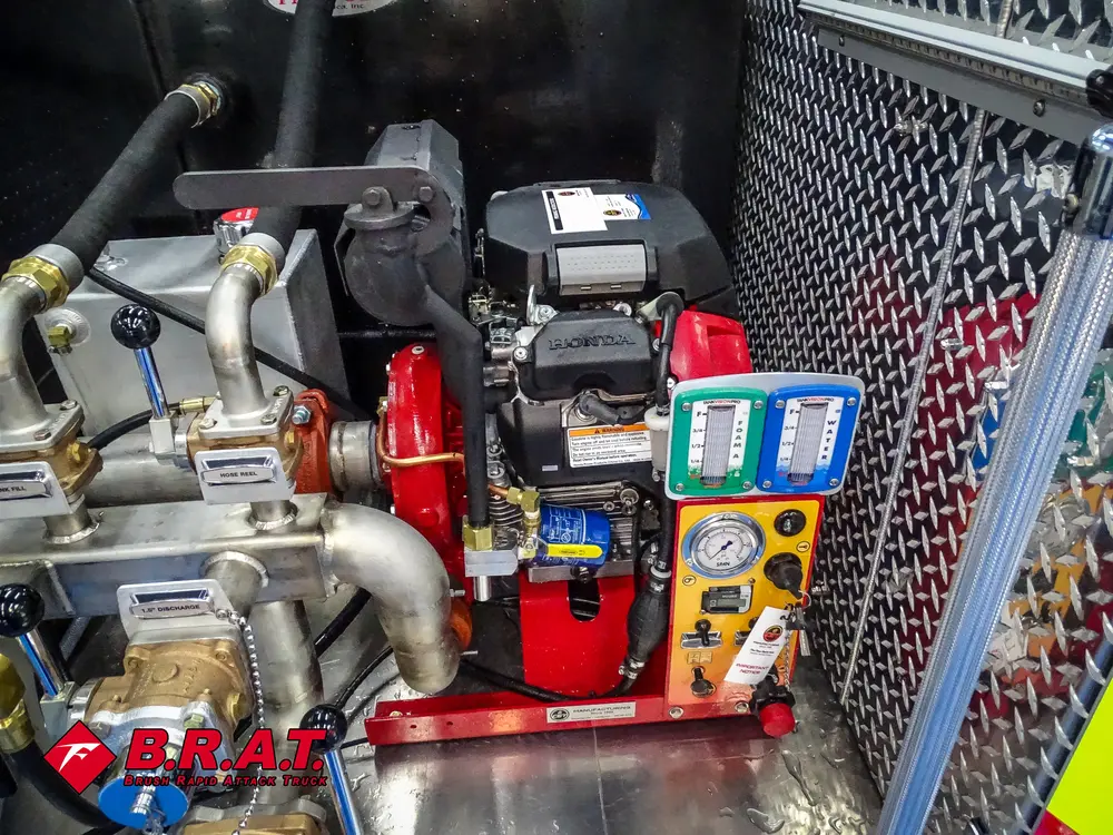 Pump bay corner with electronic control unit and hoses.