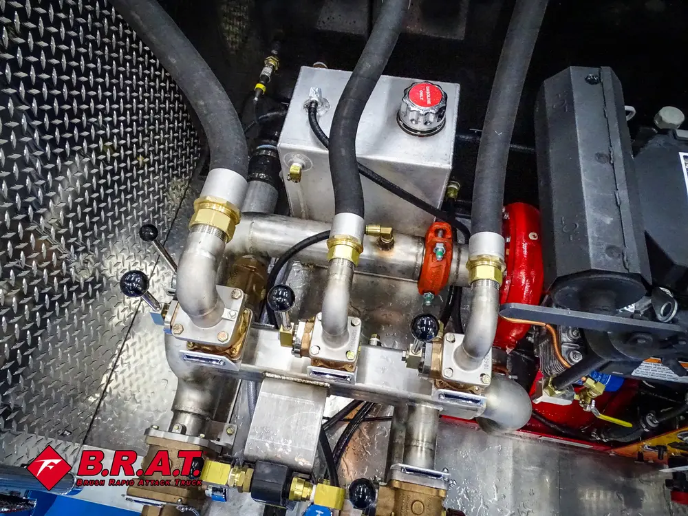 Lower pump manifold and valve assembly close-up.