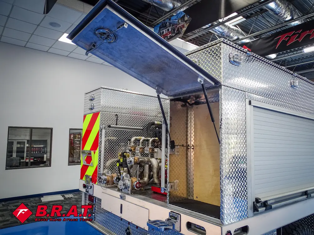 Rear side profile with open pump bay and raised top compartment lid.