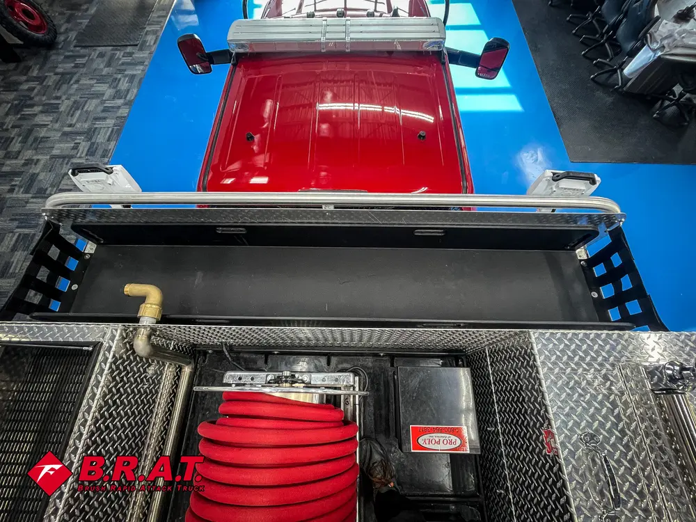 Rear deck top view looking toward cab roof and light bar.