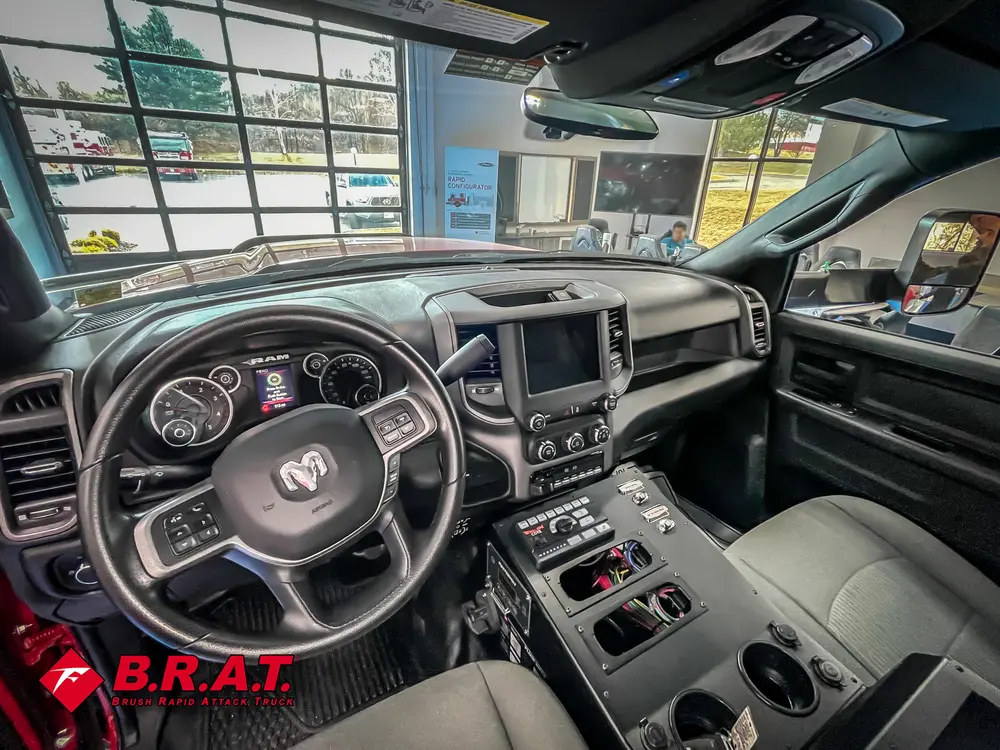 Front cabin interior wide shot from passenger side.