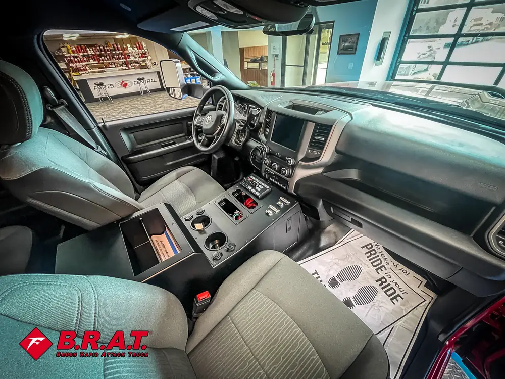 Passenger-side cabin angle with center controls and front seats.