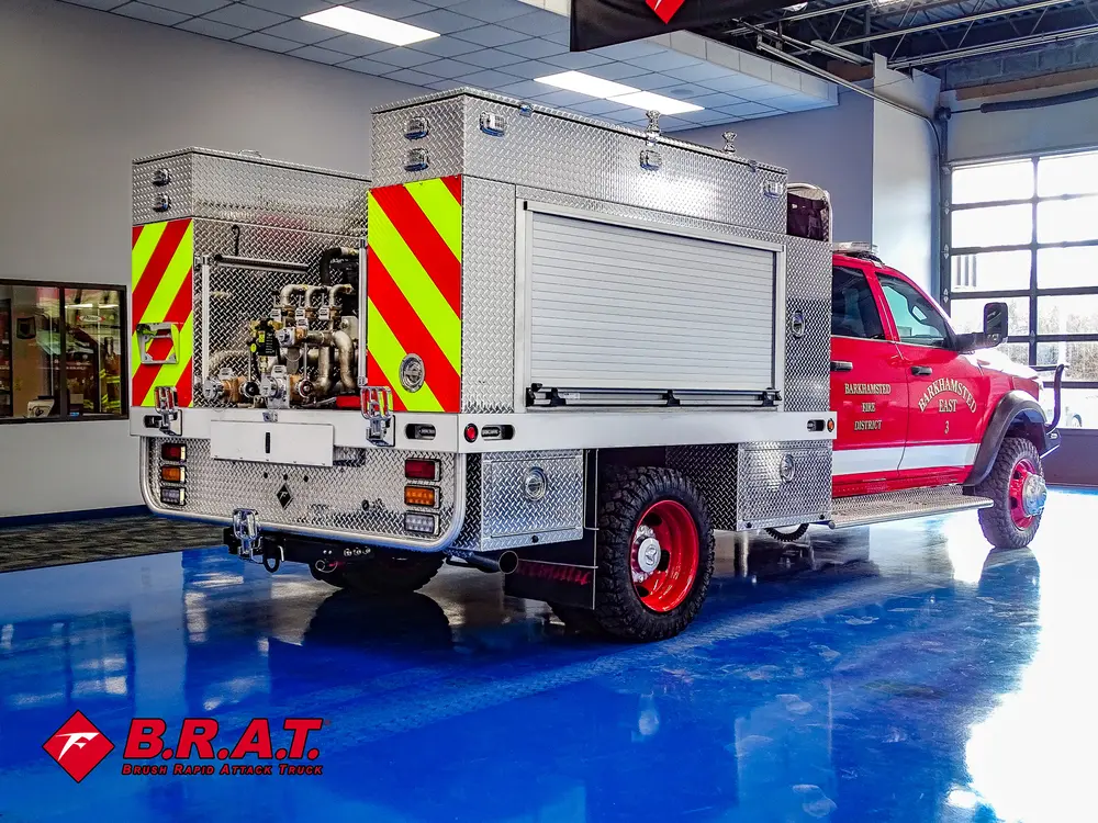 Passenger-side rear angle with pump bay visible.