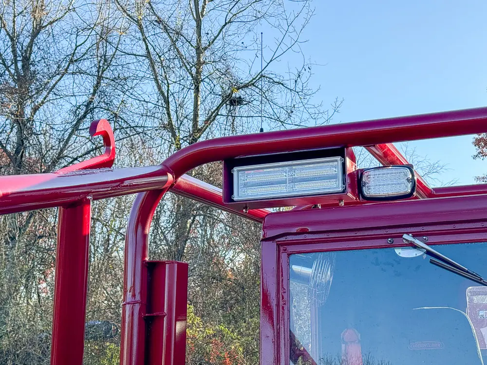 Front windshield and top rail close-up from left side.