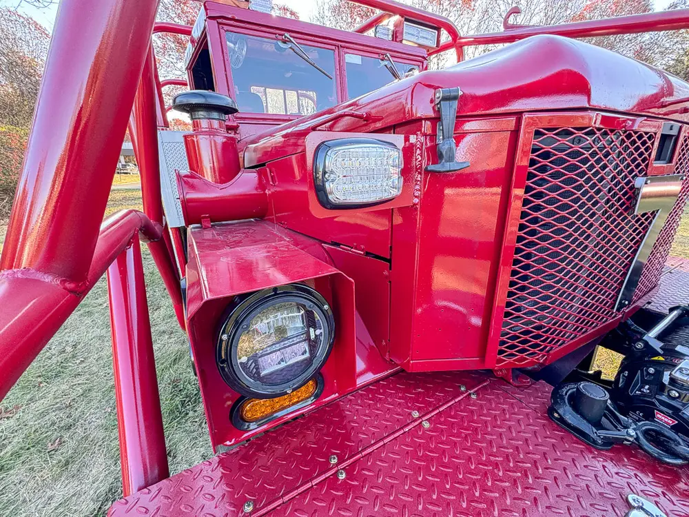 Front right headlight and grille corner close-up.