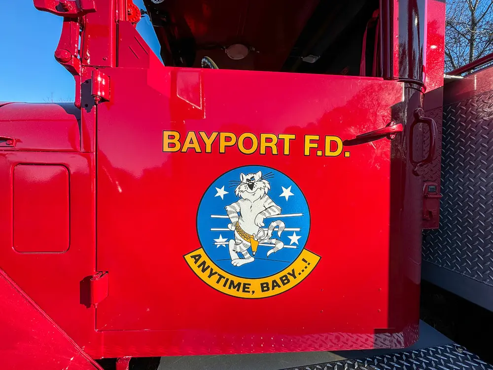 Cab door close-up with Bayport F.D. lettering and department emblem.