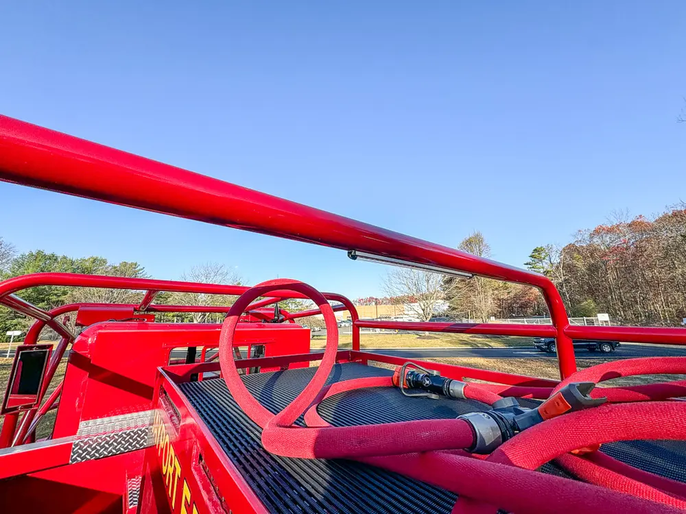 Upper deck rail and hose routing view looking forward.