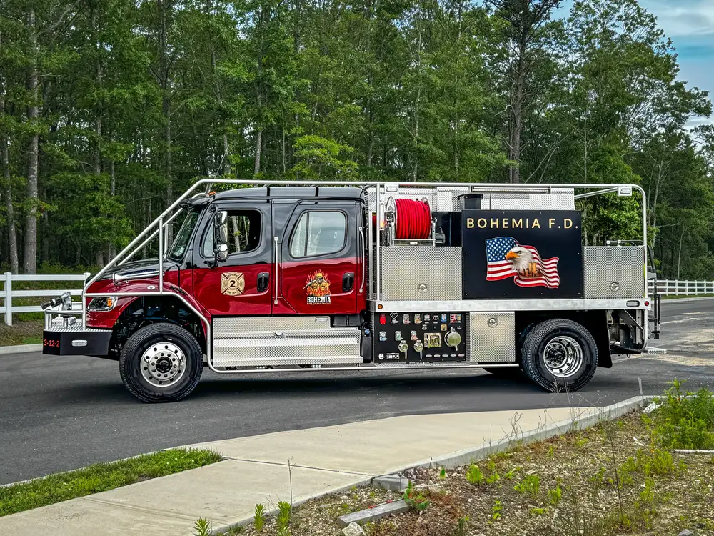 Diamond-plate body and step detail in production, photo 198 of 303.