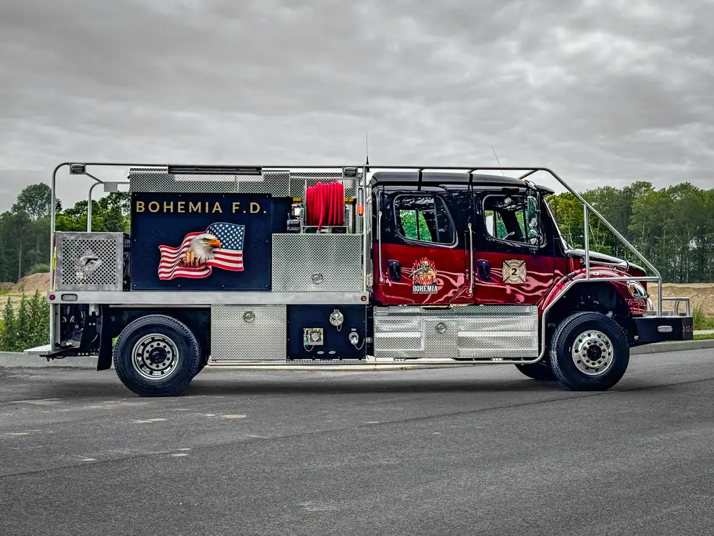 Driver-side profile of red brush apparatus outdoors, photo 202 of 303.
