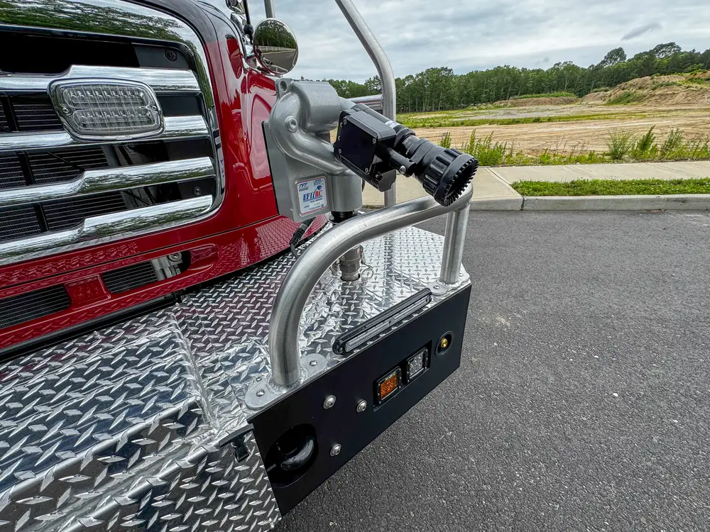 Diamond-plate body trim and step detail outdoors, photo 209 of 303.