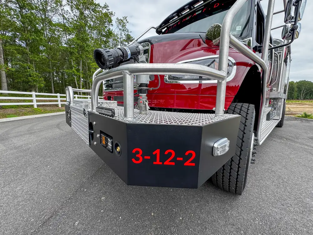 Front bumper and winch assembly close-up, photo 210 of 303.