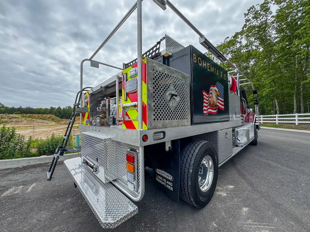 Diamond-plate body trim and step detail outdoors, photo 239 of 303.