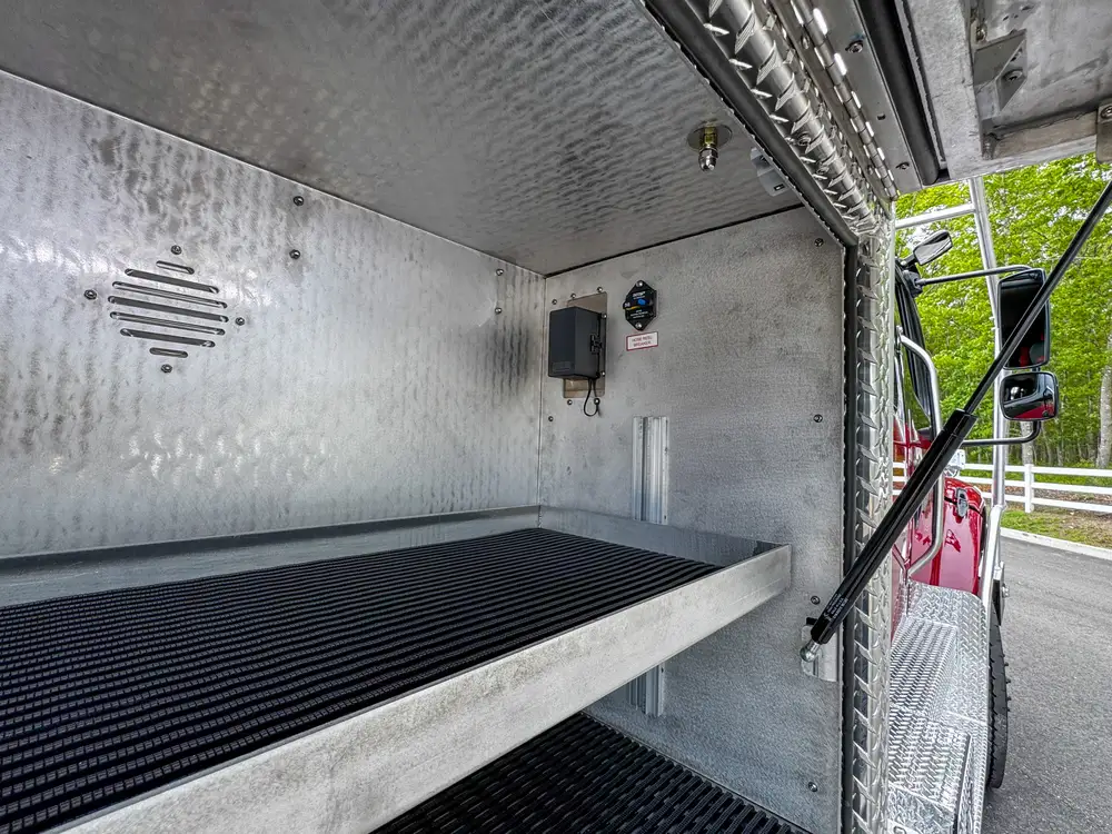 Top deck grate and hose reel detail outdoors, photo 247 of 303.