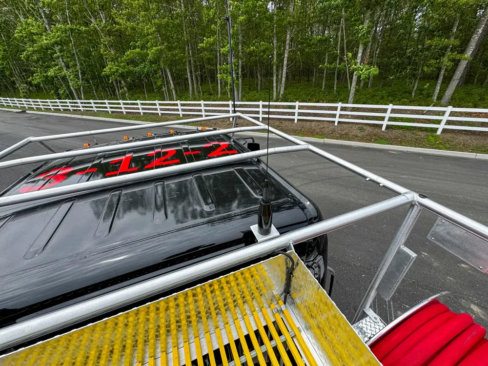 Top deck grate and hose reel detail outdoors, photo 257 of 303.