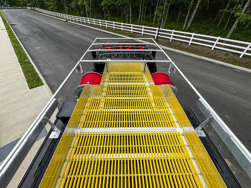 Diamond-plate body trim and step detail outdoors, photo 259 of 303.