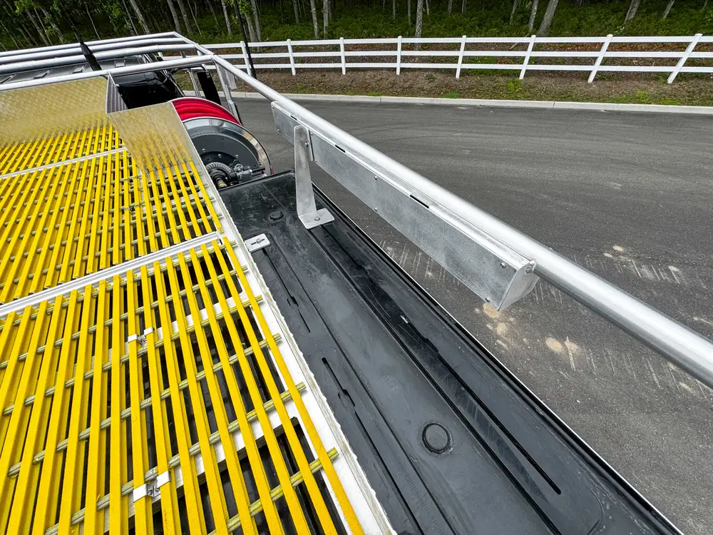 Driver-side profile of red brush apparatus outdoors, photo 262 of 303.