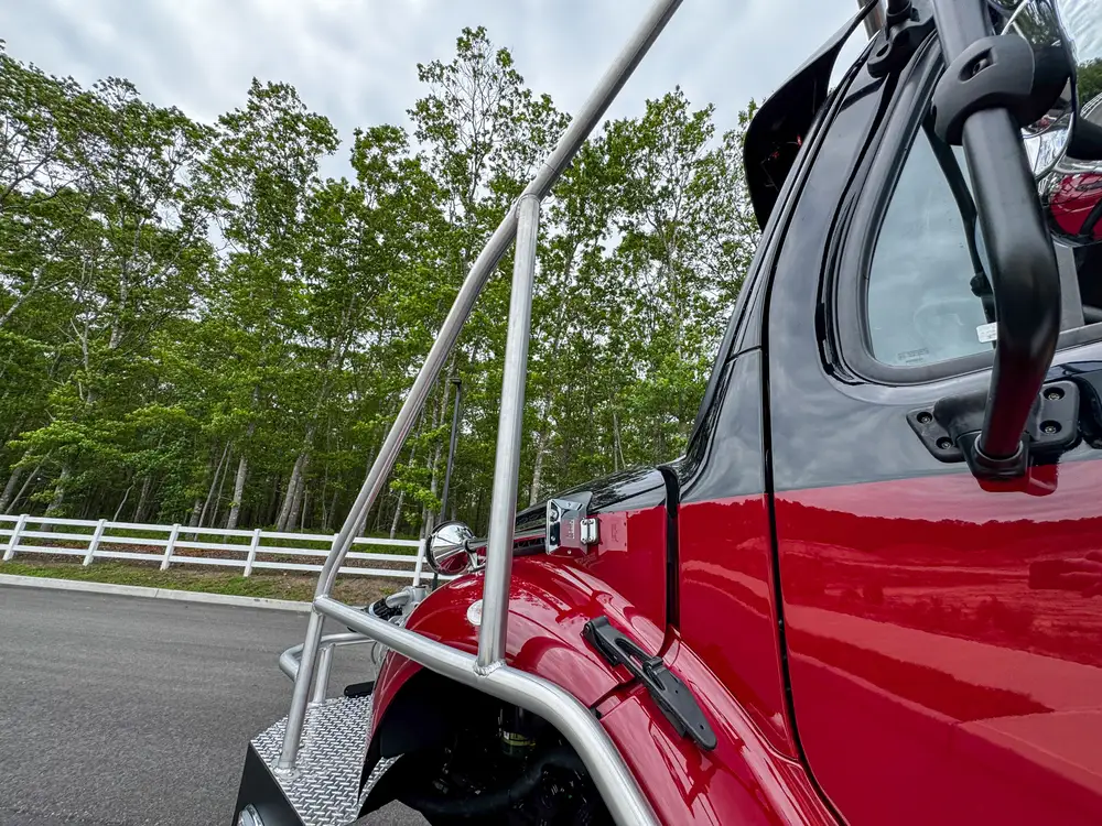 Head-on front view showing bumper and grille, photo 273 of 303.