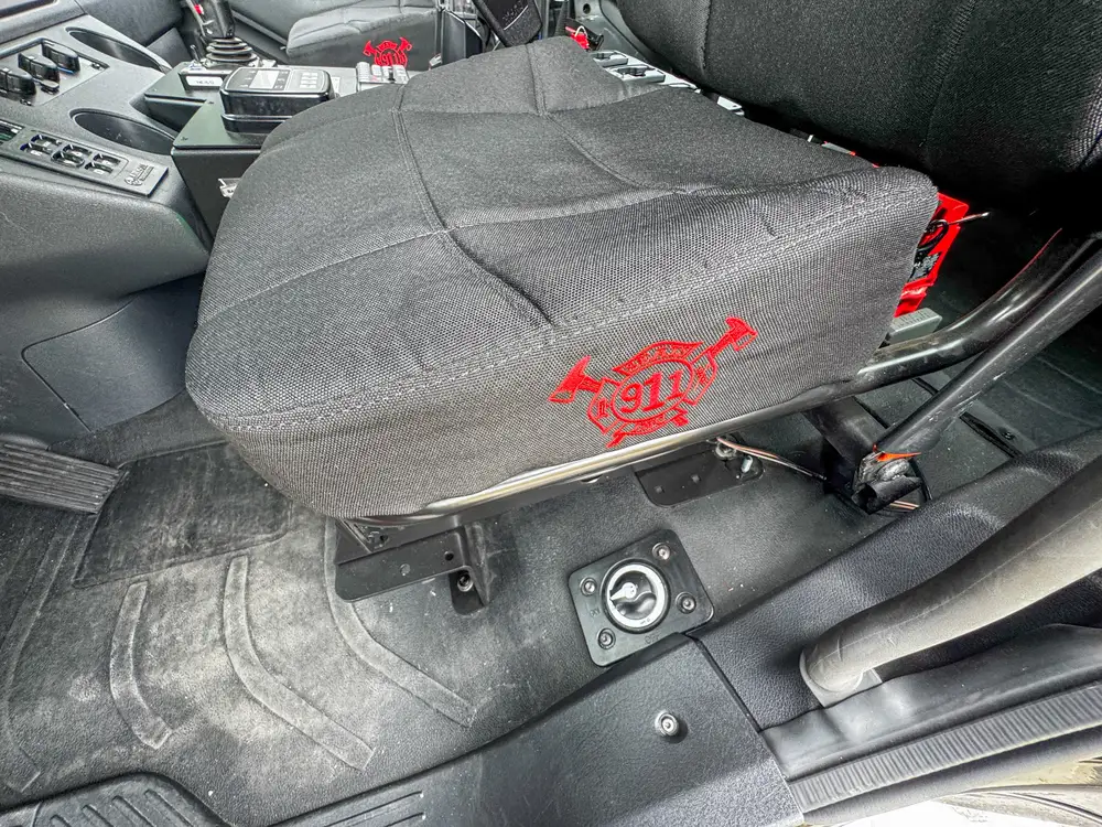 Red brush apparatus parked in front-left view outdoors, photo 281 of 303.