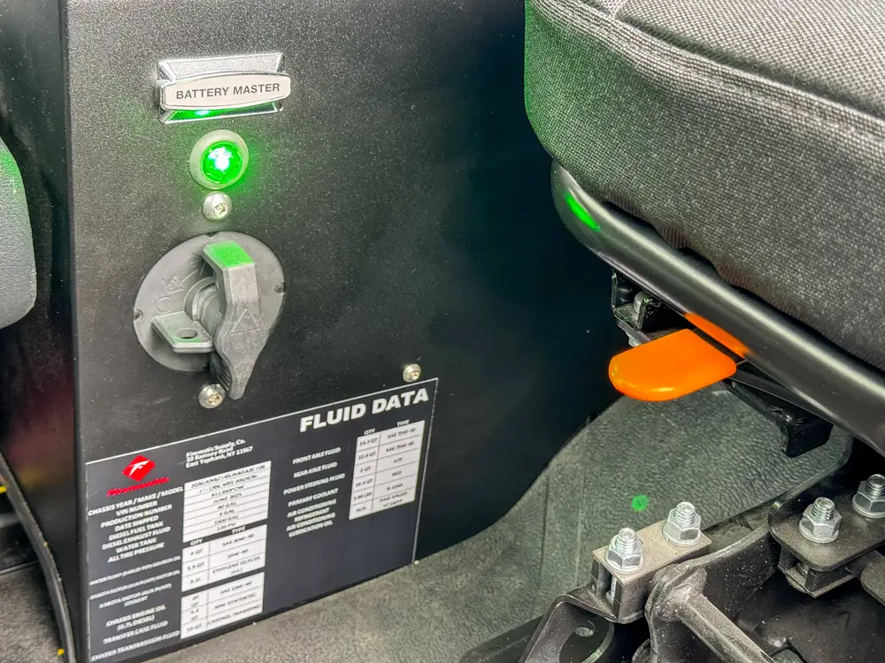 Driver-side profile of red brush apparatus outdoors, photo 282 of 303.