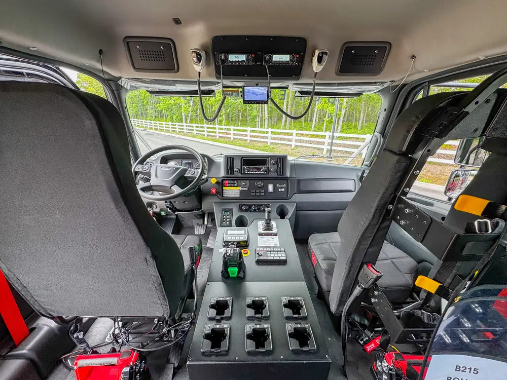 Open body compartment with storage area detail, photo 286 of 303.