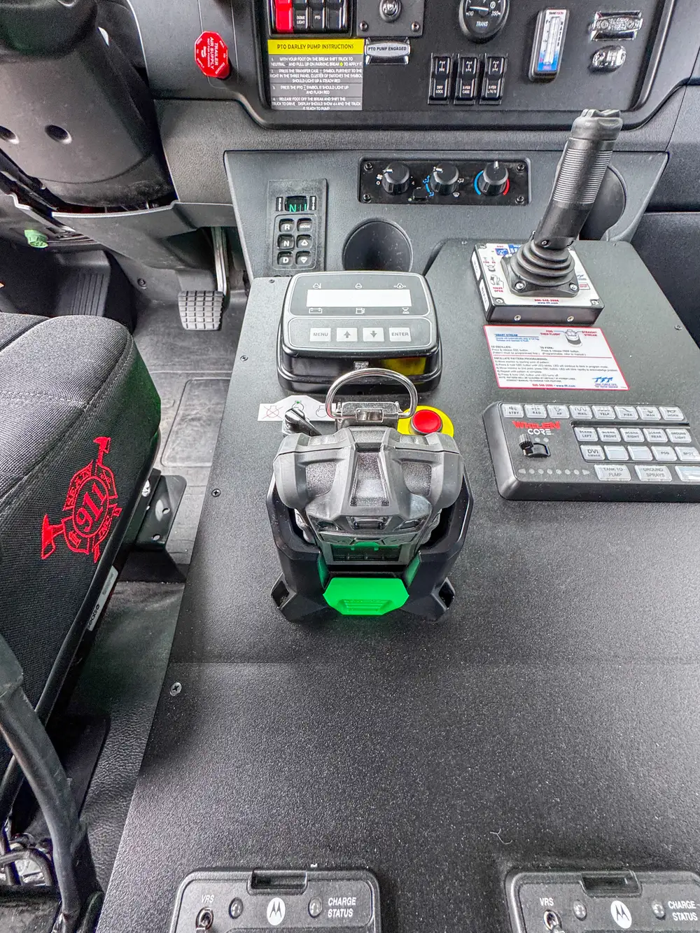 Red brush apparatus parked in front-left view outdoors, photo 291 of 303.