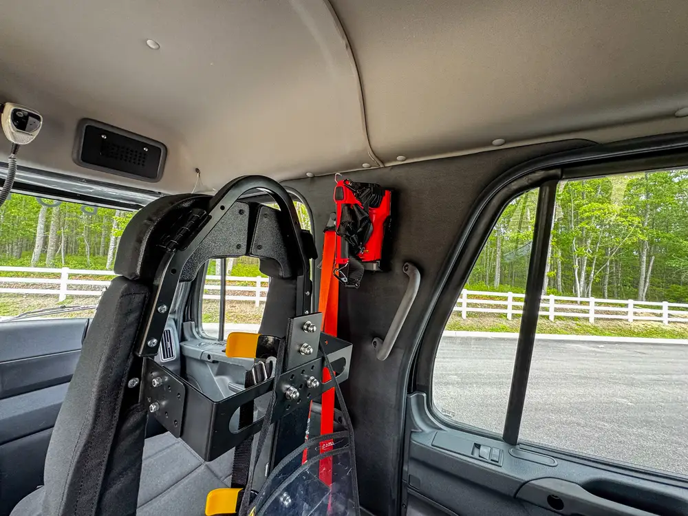 Wheel, tire, and suspension detail on apparatus, photo 298 of 303.