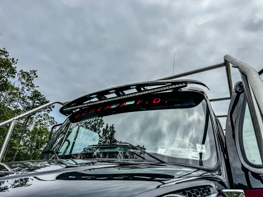 Red brush apparatus parked in front-left view outdoors, photo 301 of 303.