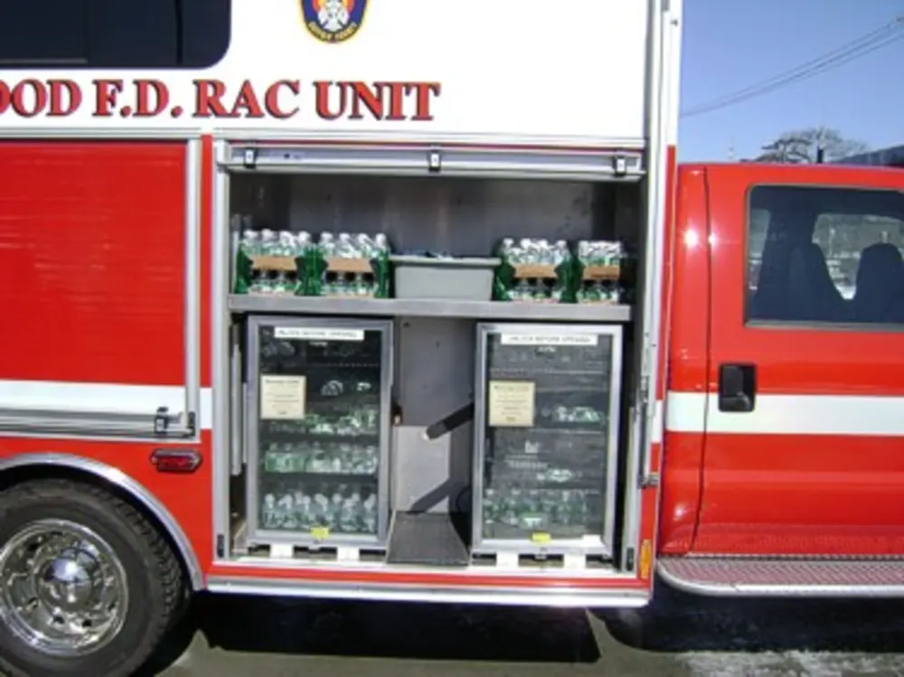 Straight rear view with dual rear doors open.