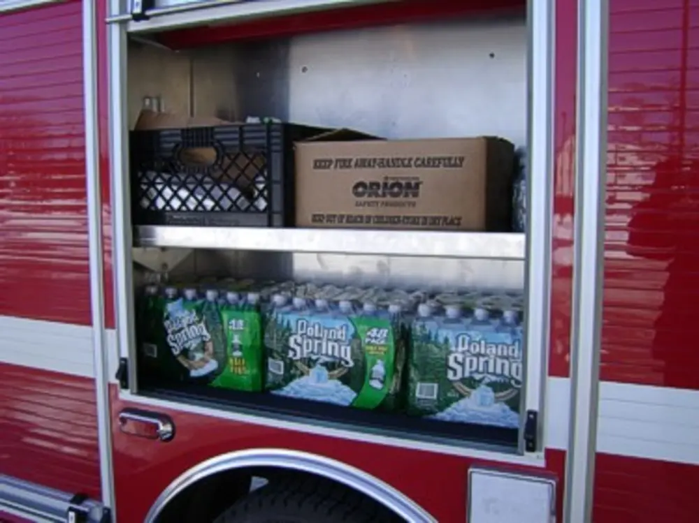 Driver-side front angle showing cab and box body.