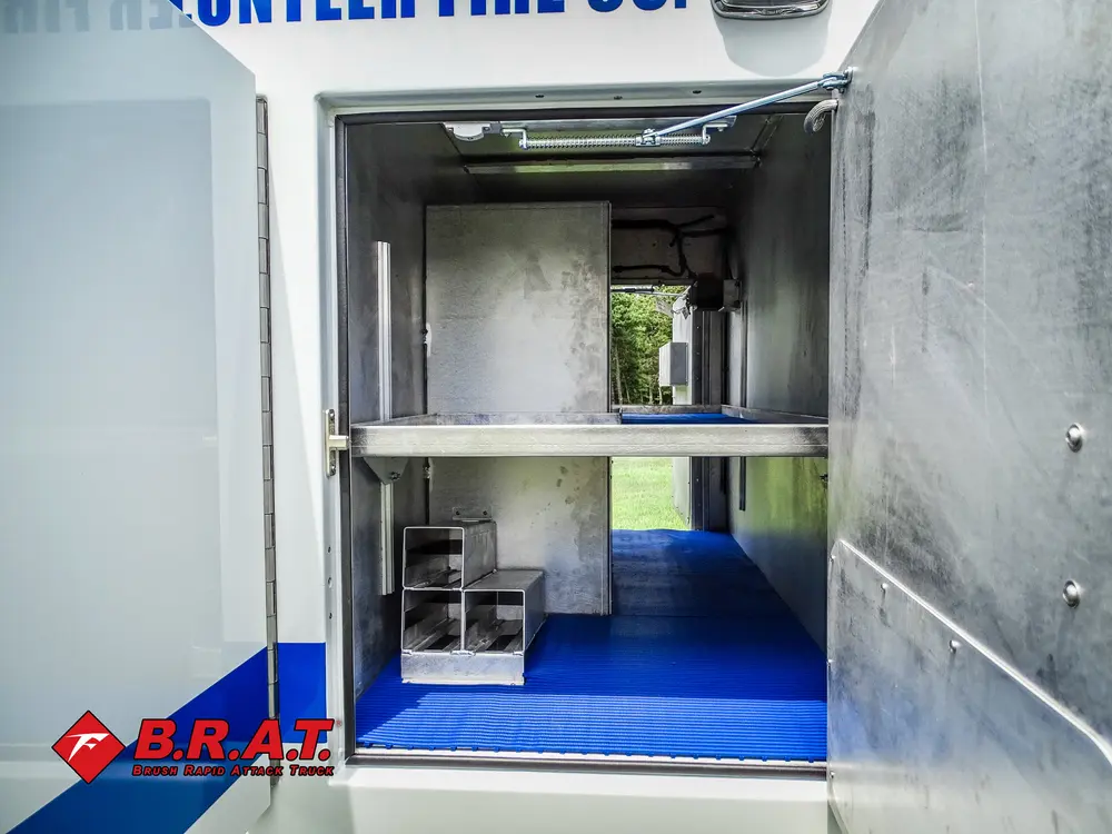 Deep storage compartment with shelves and lighting.